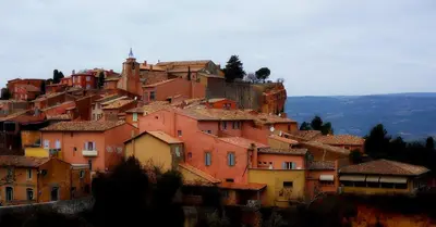 a group of houses on top of a mountain at Le Moulin de Lavon in Gargas