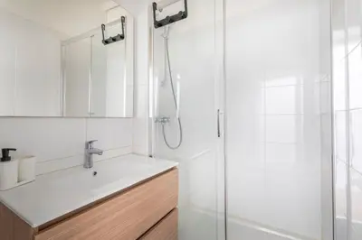 a bathroom with a sink and a shower at Studio place cardeurs in Aix-en-Provence