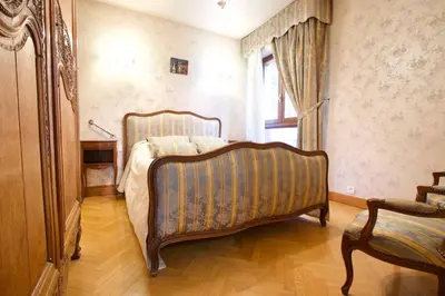 a bed with two drawers and a bed frame at Le Jourdan clim' terrasse ascenseur garage in Aix-en-Provence