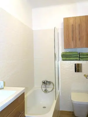 a bathroom with a shower and a toilet and a sink at TILIA JOURDAN-Studio Cosy Aix Centre-Cours MIRABEAU-PARKING-WIFI-SMART TV-RUE CALME in Aix-en-Provence