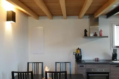 a dining room with a table and chairs at Coin de paradis en Provence in Saint-Cannat