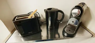 a counter top with a toaster and a blender at Studio centre historique 200 m de la mairie - Climatisé in Aix-en-Provence
