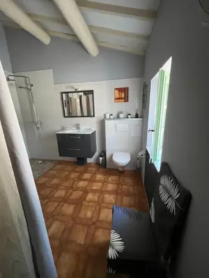 a bathroom with a sink and a toilet at 84A - 