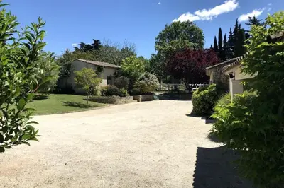 a driveway in front of a house at 84A - 
