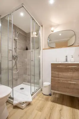a bathroom with a shower and a toilet and a sink at La Venise Provençale - Hypercentre - Wifi in LʼIsle-sur-la-Sorgue