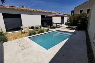 a swimming pool in the backyard of a house at La Dolce Vita Provençale Charming House with its Private Swimming Pool in LʼIsle-sur-la-Sorgue