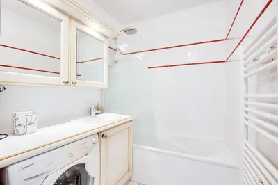 a laundry room with a washer and dryer at Village Pont Royal en Provence - maeva Home - Appartement climatisé avec terrasse 4 pièces 7 personnes - Prestige - super Home MAE-3801 in Mallemort