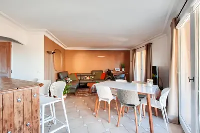 a kitchen and living room with a table and chairs at Village Pont Royal en Provence - maeva Home - Appartement climatisé avec terrasse 4 pièces 7 personnes - Prestige - super Home MAE-3801 in Mallemort