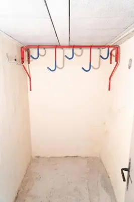 a bathroom with a red rack in a room at L'évasion de Bedoin, appartement in Bédoin
