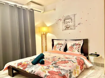 a bedroom with a bed with a teddy bear on it at *Le Lotus*Fiber Wifi*Hyper Center* in Salon-de-Provence