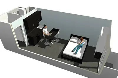 two people in a living room with a tv at STUDIO Mr&Mrs in Aix-en-Provence