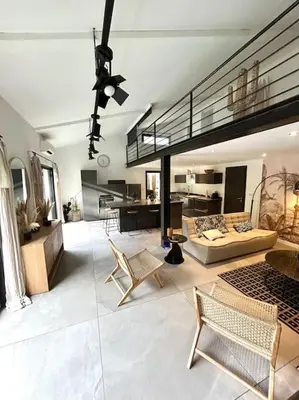 a large living room with a couch and chairs at Superbe maison avec jacuzzi in Ventabren