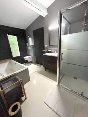 a bathroom with a shower and a sink at Superbe maison avec jacuzzi in Ventabren