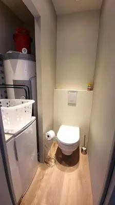 a small bathroom with a toilet and a sink at LOU BRISOU in Saint-Saturnin-les-Apt