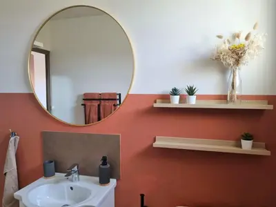 a bathroom with a mirror and a sink at Joli studio lumineux centre avec parking securise dans quartier recherche in Aix-en-Provence
