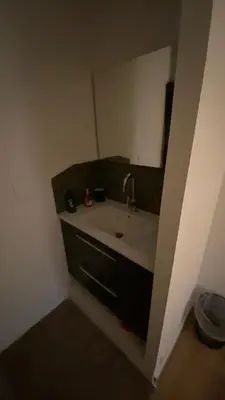 a bathroom with a sink and a mirror at la chambrette in Lincel