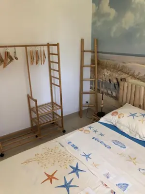 a backyard with a swimming pool and a house at Halte Vintage. A l’ombre du saule. in Carpentras