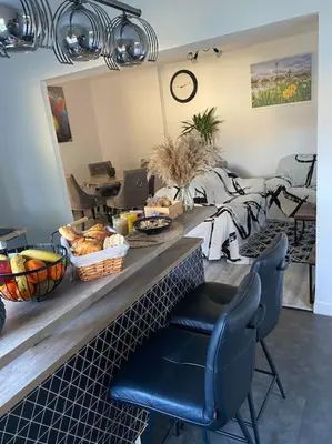 a kitchen with a table with food on top of it at SPA jardin privé T3 indépendant dans Villa in Morières-lès-Avignon