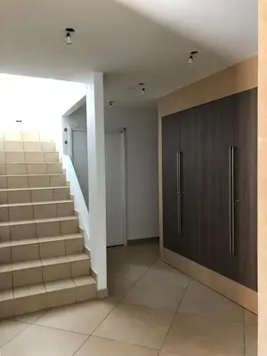 a staircase in a room with a stair case at Villa Oasis Luxury and Relaxation in Provence in Lambesc