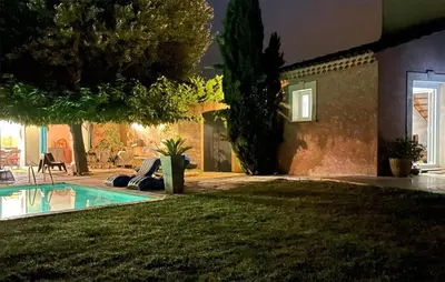 a house with a swimming pool in a yard at Nice Home In Eyguieres With Wifi in Eyguières