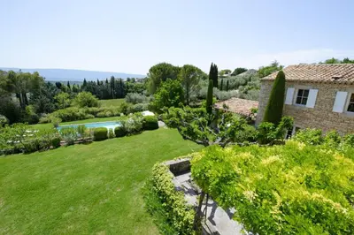 an aerial view of a garden and a house at Mas des Papillons Gordes in Gordes