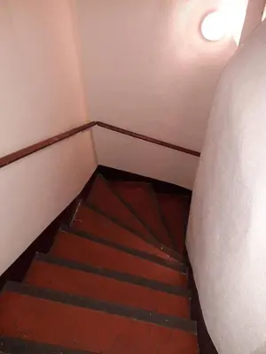 a staircase in a room with a stair case at Studio, Aix centre historique in Aix-en-Provence