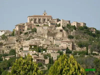 a village on top of a mountain at Gordes Le Bastidon in Gordes