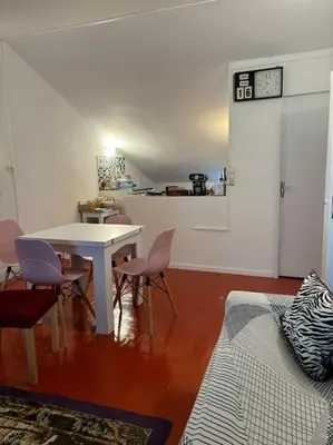a living room with a white table and chairs at plein coeur de BANON in Banon