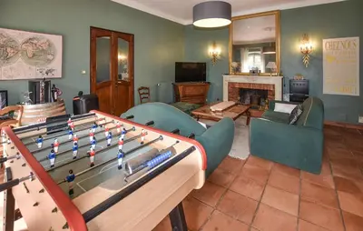 a living room with a billiard table in the middle at Nice Home In Entraigues-Sur-La-Sorg in Entraigues-sur-la-Sorgue