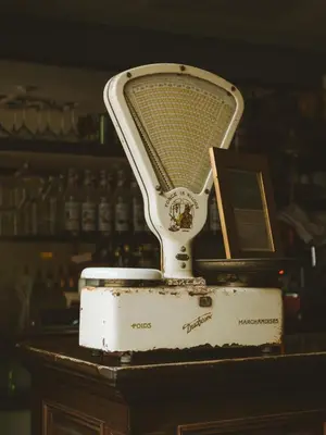 a white hairdryer sitting on top of a table at Le Saint Hubert in Saint-Saturnin-les-Apt