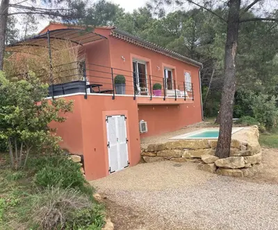 a house with a pool in front of it at La villa Rosa in Bédoin