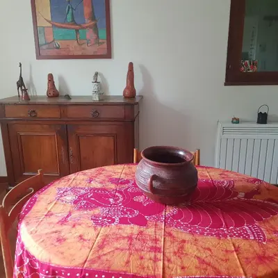 a table with a bowl on top of it at Chambre dans Petit havre de paix avec piscine chauffée au coeur du Luberon in Gargas