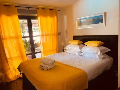 a bedroom with a bed with a toy truck on it at Maison AdriAnna in Vedène