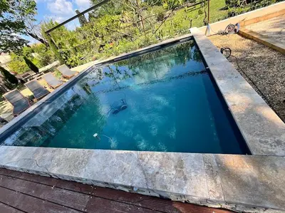 a swimming pool on top of a house at La provence avec piscine privative en campagne in Pernes-les-Fontaines