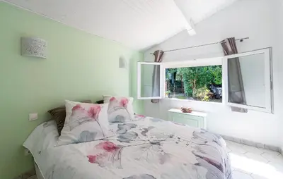 a bedroom with a bed and a window at Gorgeous Home In Miramas in Miramas