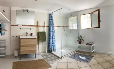a bathroom with a shower and a sink at Les Lavandes in Saignon