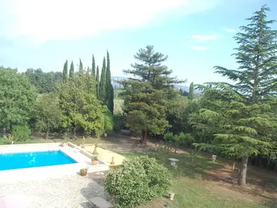 an image of a swimming pool in a garden at Camargue Modern retreat in Cavaillon
