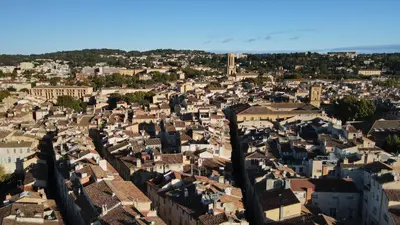 an aerial view of a city with buildings at Appartement centre historique Aix en Provence, Place RAMUS in Aix-en-Provence