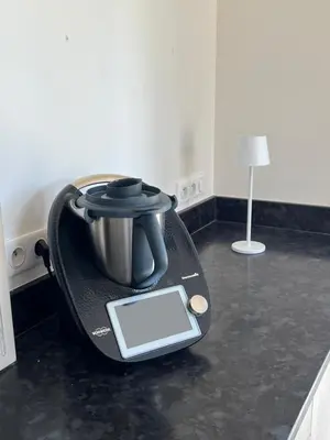 a pot sitting on top of a stove with a tablet at LAVENINE a Modène in Modène
