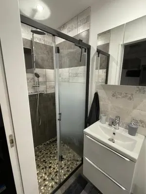 a bathroom with a shower and a sink at La maison Anaïa in Gargas