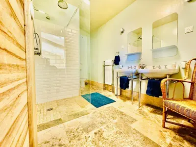 a bathroom with a sink and a shower at Proche l'Isle/Sorgue, loft avec SPA et Piscine in Le Thor