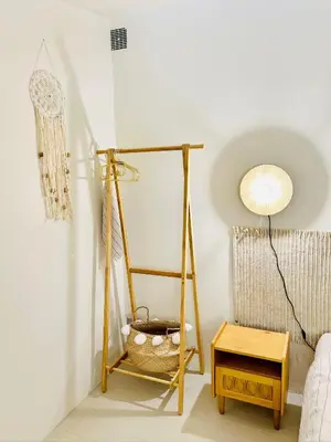 a room with a shelf and a basket on the wall at Maison Joucas in Joucas