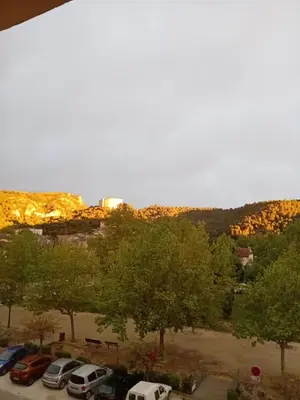 a view of a parking lot with cars parked at T3 campagne Aix-en-Provence in Meyrargues