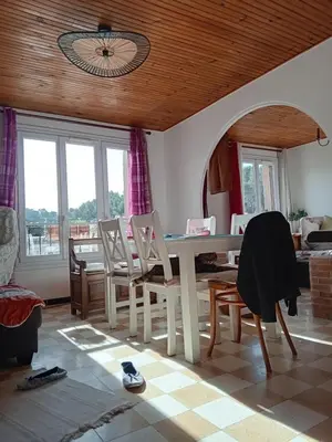 a living room with a table and chairs at T3 campagne Aix-en-Provence in Meyrargues