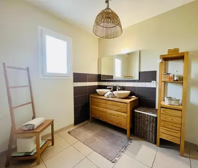 a bathroom with a sink and a mirror at La villa Louca in Saint-Saturnin-les-Apt
