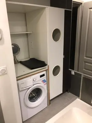 a small bathroom with a washing machine in it at Pitchoun in Velaux