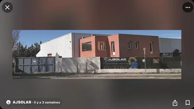 a building with a mural on the side of it at Pitchoun in Velaux