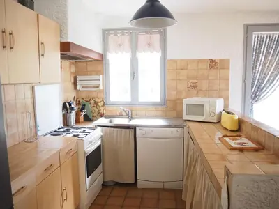 a small kitchen with a sink and a microwave at Holiday Home in Provence near Mont Ventoux in Bédoin