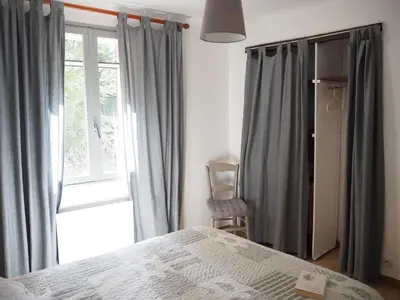 a bedroom with a bed and a window at Holiday Home in Provence near Mont Ventoux in Bédoin
