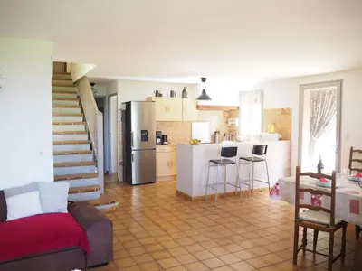 a kitchen and living room with a couch and a refrigerator at Holiday Home in Provence near Mont Ventoux in Bédoin